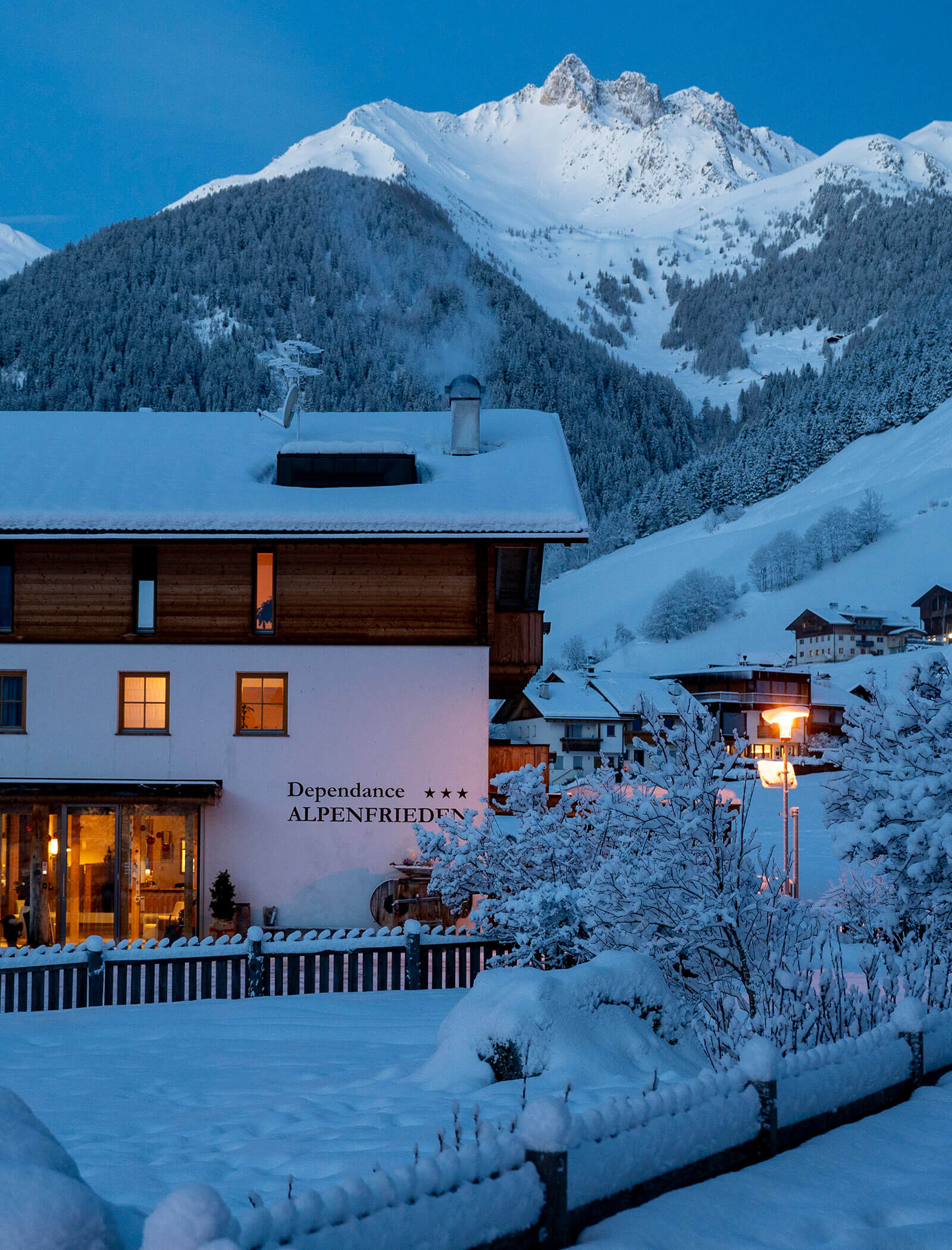 Berghotel Alpenfrieden from outside in winter evening