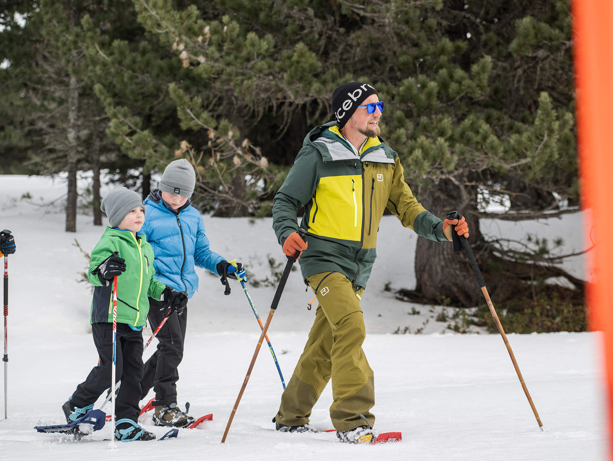 Father with two sons snowshoeing - Berghotel Alpenfrieden